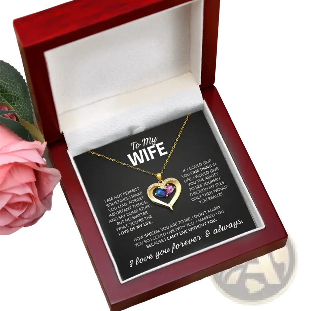 Gold heart-shaped birthstone necklace with blue and purple gemstones in red gift box with engraved card for wife