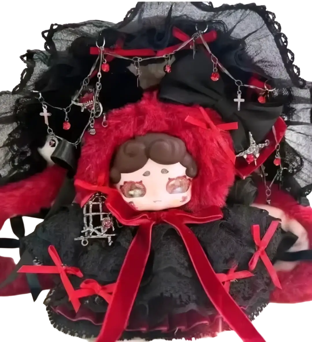 A plush bjd doll with brown hair red eyes in black lace outfit with red ribbons and hanging charms for replacement accessories