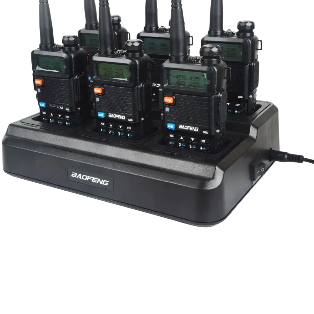Black baofeng bf-888s walkie talkies neatly arranged in bl-5x6 six way rapid charger for uv-5r radios