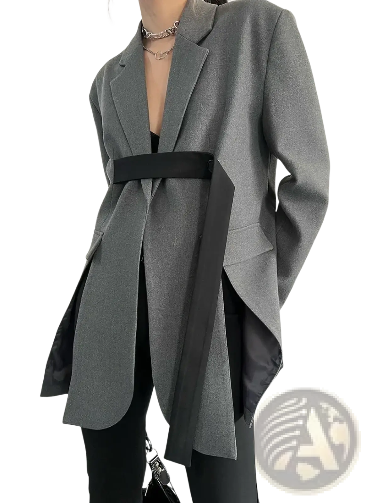 Gray oversized blazer with black belt and asymmetrical hem showcasing a modern tailored design