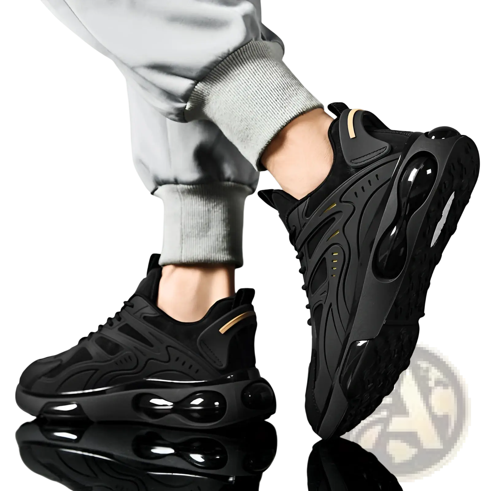 Black breathable mesh sneakers with glossy air cushioning units and subtle gold accents on the heel