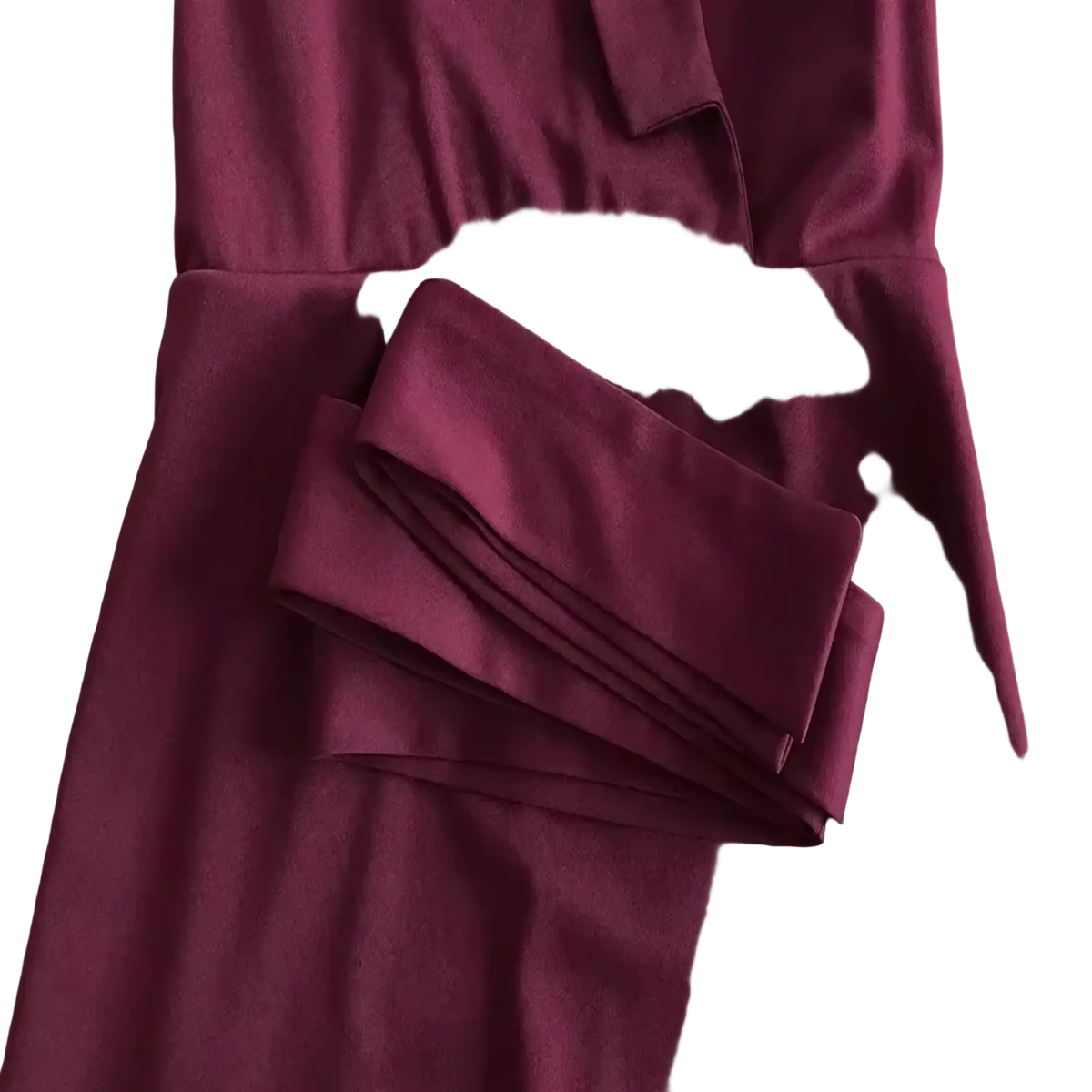 Black cape sleeve jumpsuit in rich burgundy with softly textured fabric, fitted bodice, and belt detail