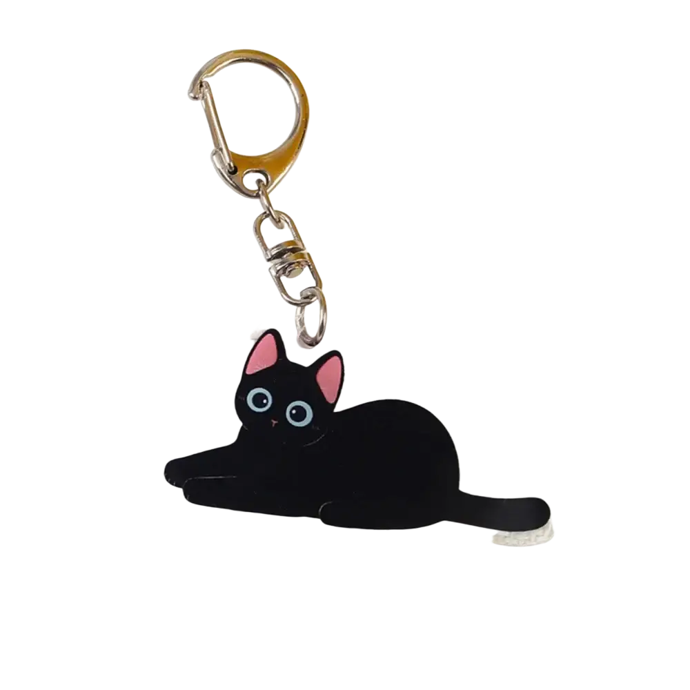 Clear acrylic black cat keychain with pink ears blue eyes and cloud-shaped tail detail for bag charm use
