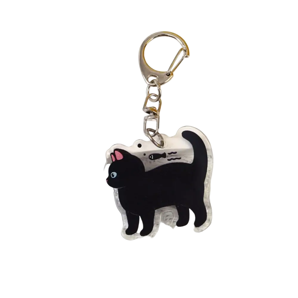Clear acrylic black cat keychain with pink ears and blue eyes holding a fish cartoon animal bag charm