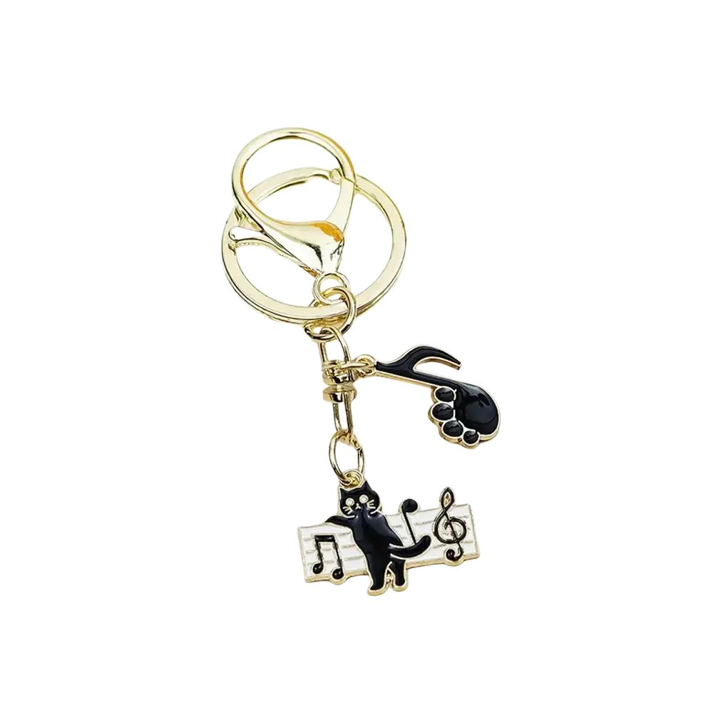 Gold-toned black cat piano keychain with black enamel cat on musical notes and paw print charm for music lovers gift