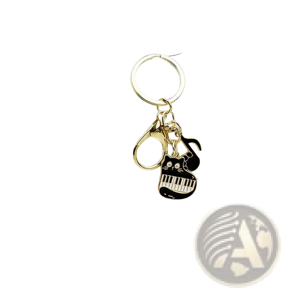 Gold-toned black cat piano keychain with white keys and silver eyes attached to a circular ring music lover gift