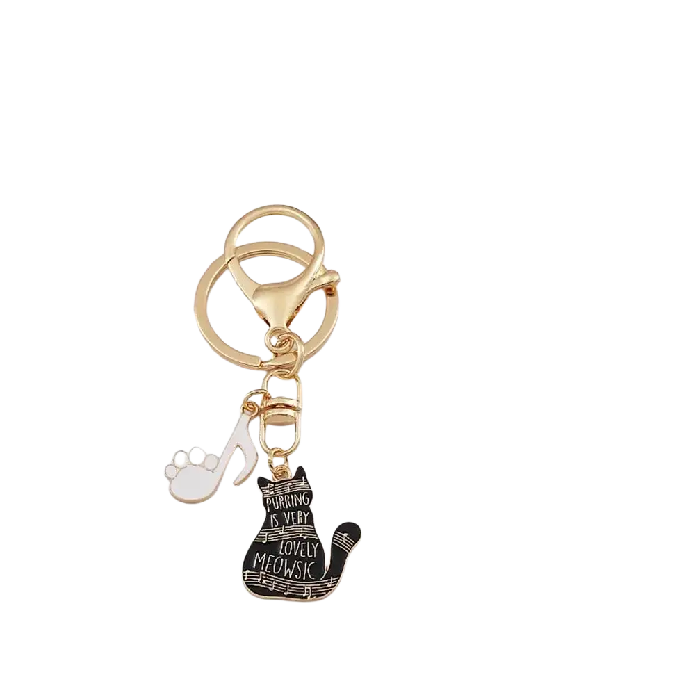 Gold-toned keychain with black enamel cat charm featuring white text and musical notes for music lovers gift