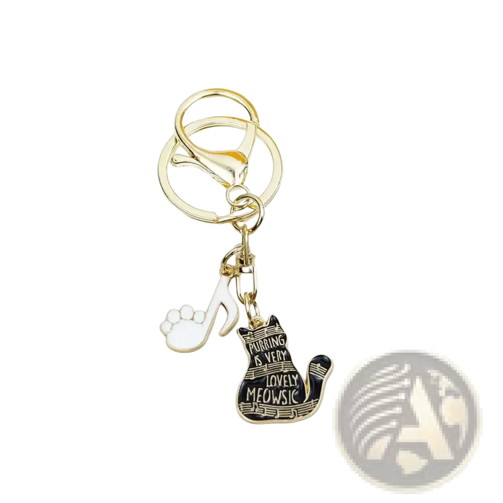 Gold-toned black cat piano keychain with enamel charm featuring purring is very lovely meowsic phrase and white paw print pendant