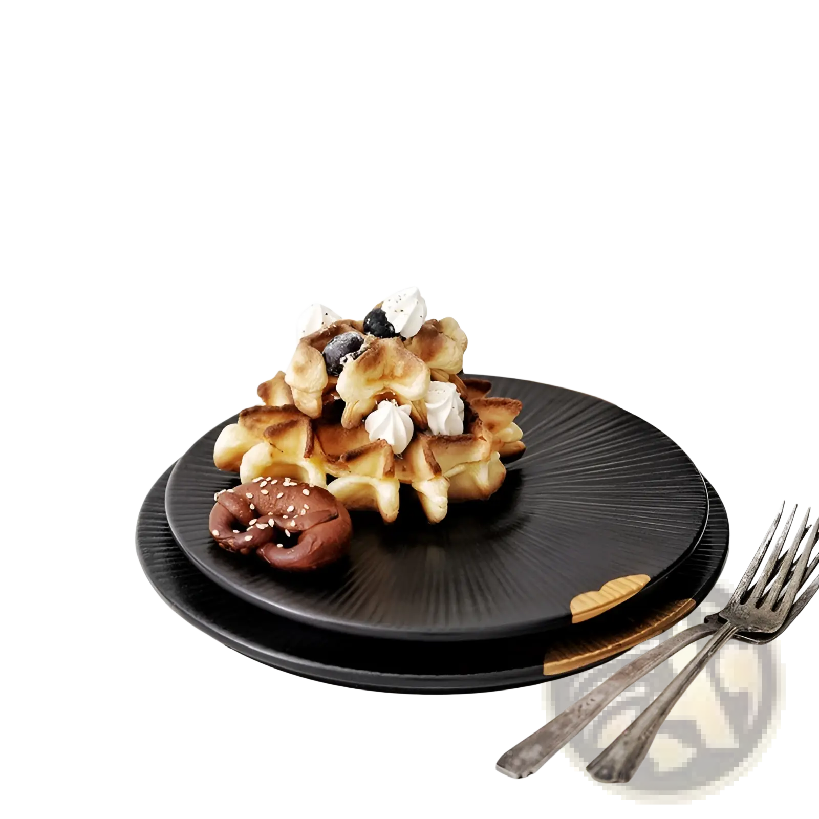 Black ceramic plate with gold and wood rim accents holding golden-brown waffles topped with whipped cream and blueberries