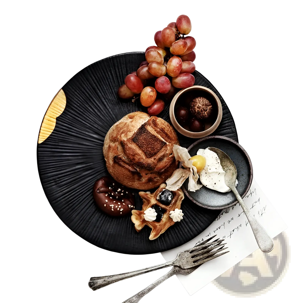 Black ceramic plate with radial ridges featuring gold and wood rim accents for elegant dining use