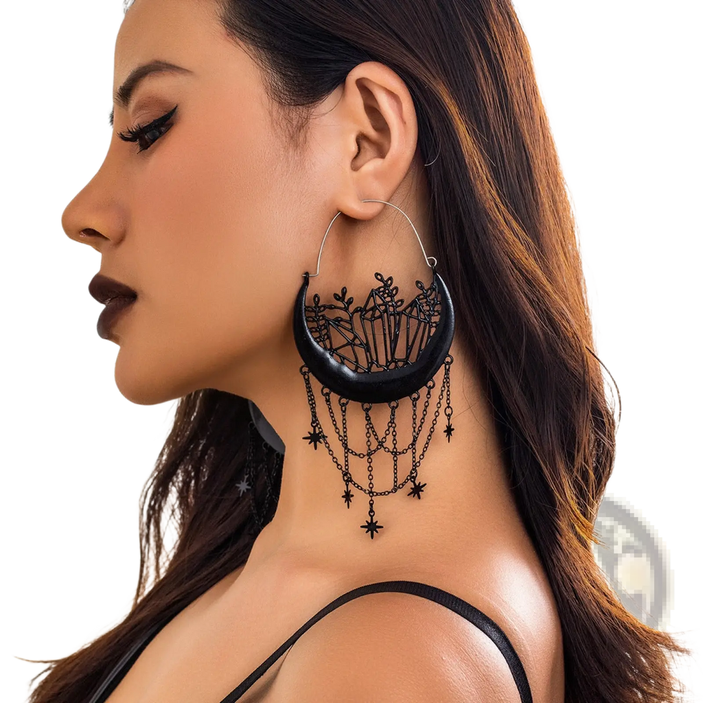 Black crescent moon tassel earrings with lace-like detailing and dangling star chains in elegant hoop design