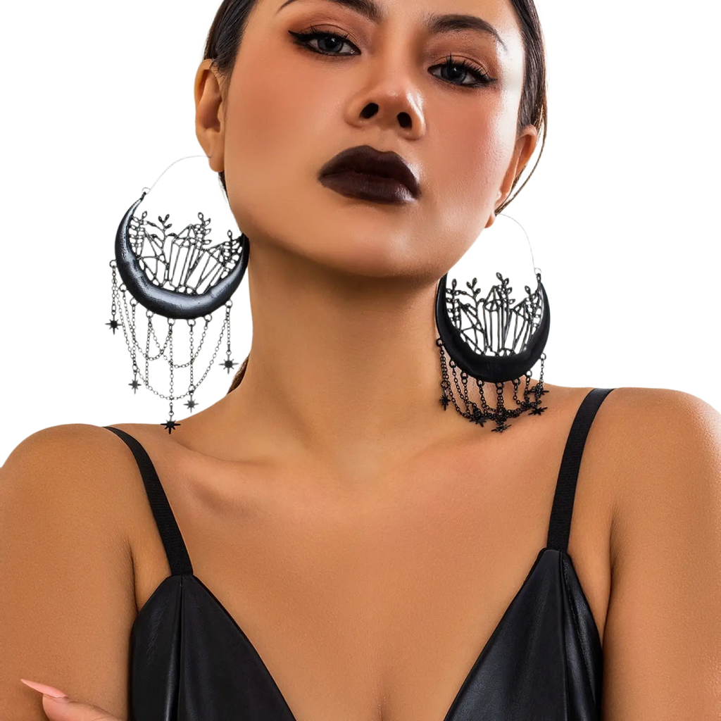 Black crescent moon tassel earrings with intricate crystal and star designs and dangling star chains