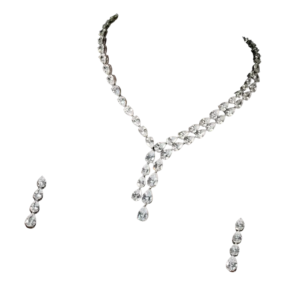 A black crystal jewelry set featuring a sparkling silver necklace with pear-shaped crystals and matching drop earrings