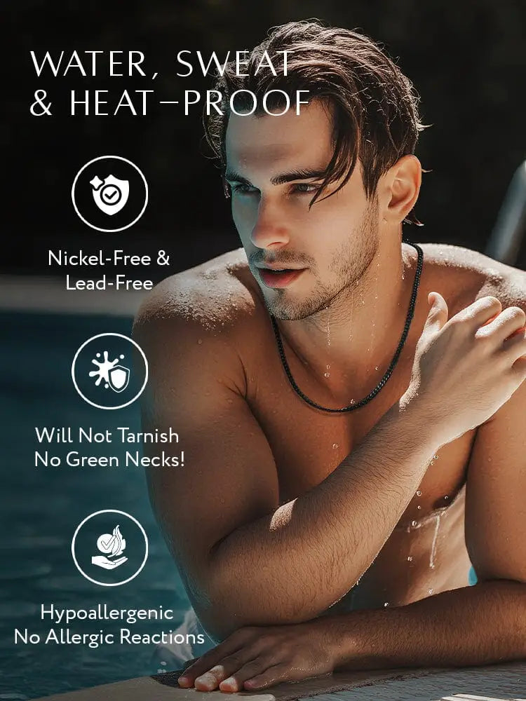 Man wearing a 5mm black diamond cut stainless steel Cuban link chain with black beads in water