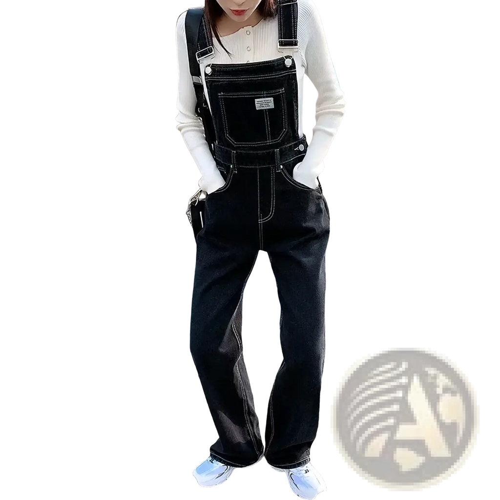 Black denim overalls straight leg jumpsuit with white stitching and adjustable straps in a durable fabric