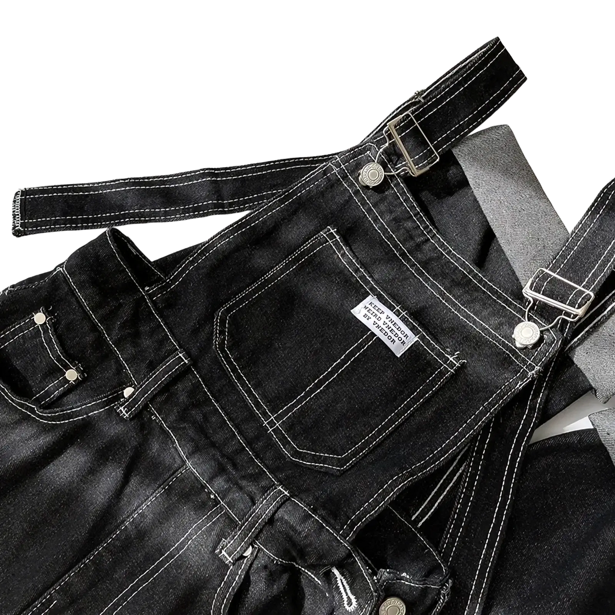 Black denim overalls straight leg jumpsuit with white stitching and silver toned metal hardware