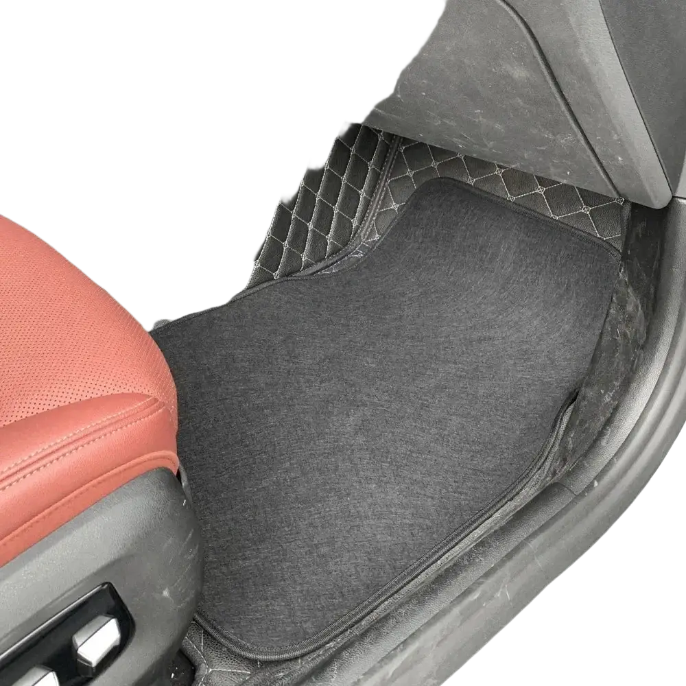 Black diamond car floor mats front and rear set with black quilted plush surface and stitched diamond edge pattern