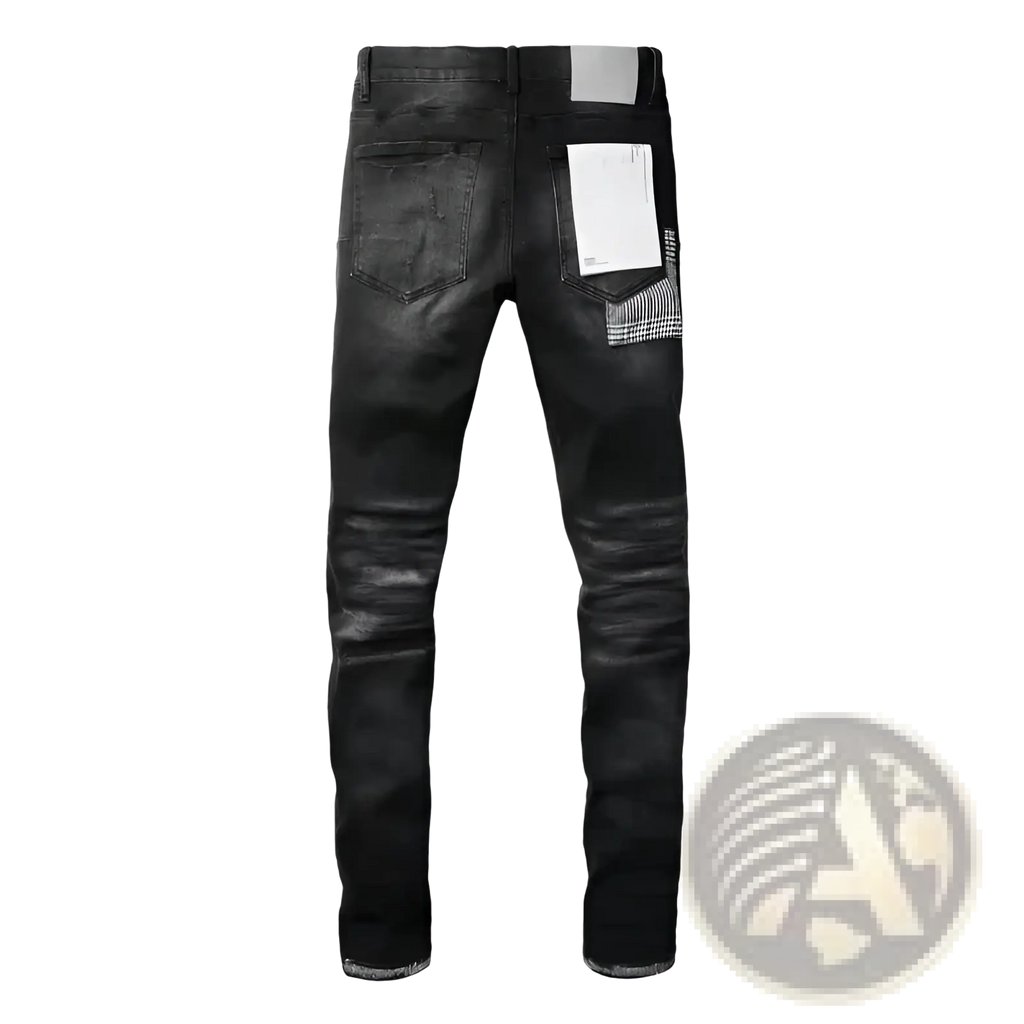 Black distressed patchwork skinny jeans showing back side with plaid fabric accent and white rectangular label on pocket