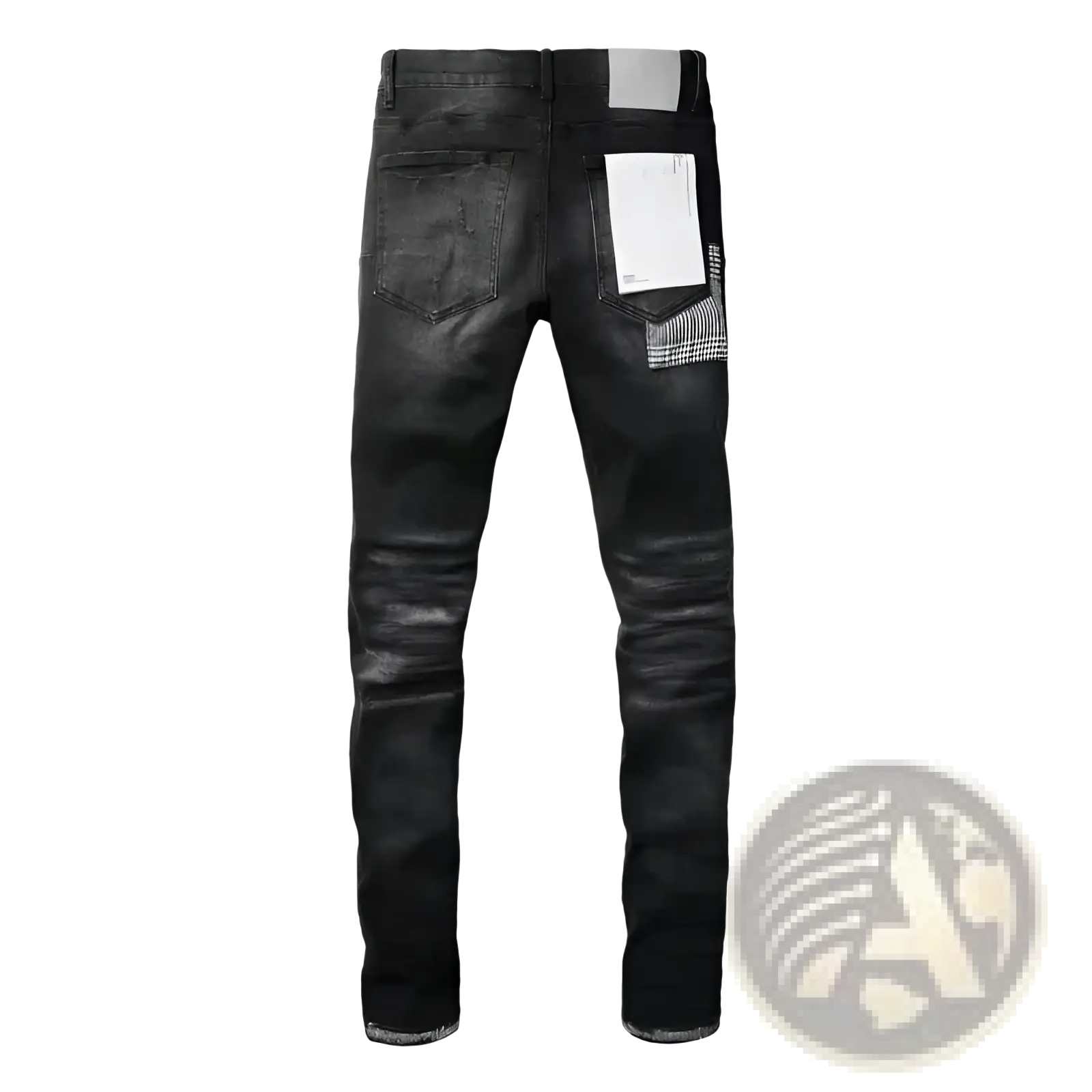 Black distressed patchwork skinny jeans showing back side with plaid fabric accent and white rectangular label on pocket
