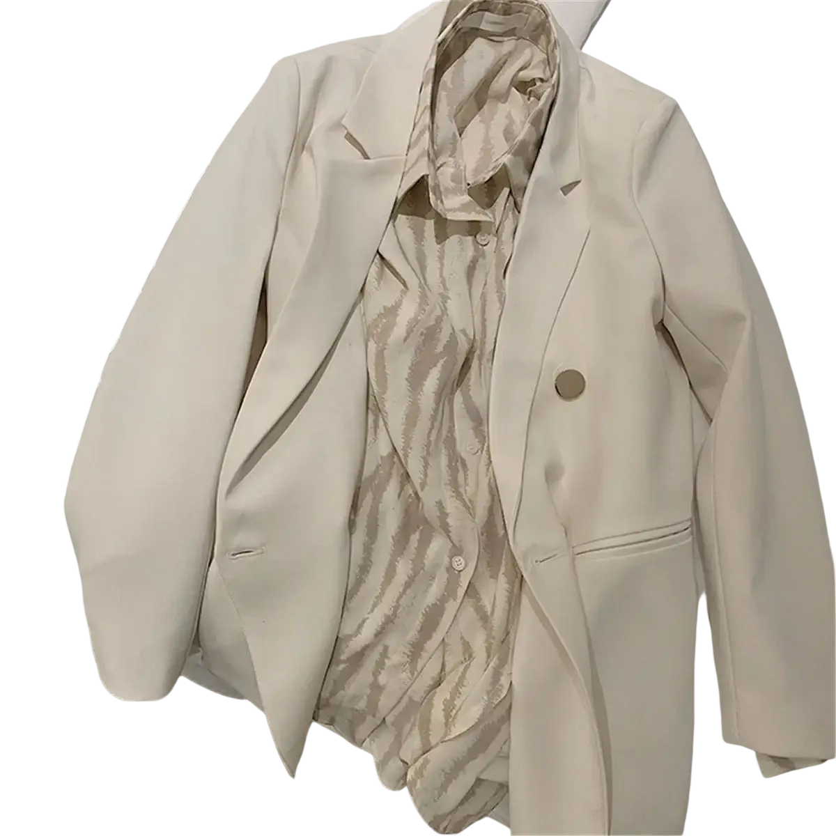 Black double-breasted blazer with gold buttons in cream color featuring a sleek tailored design and subtle sheen
