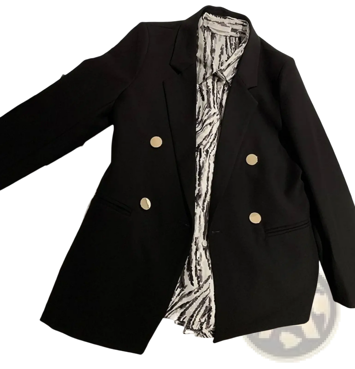 Black double-breasted blazer with gold buttons and a zebra-print inner lining for stylish formal wear