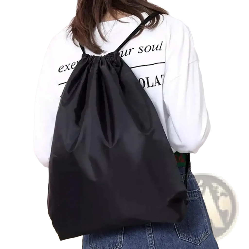 Black drawstring gym backpack with large capacity sleek minimalist design and smooth fabric finish for sports use