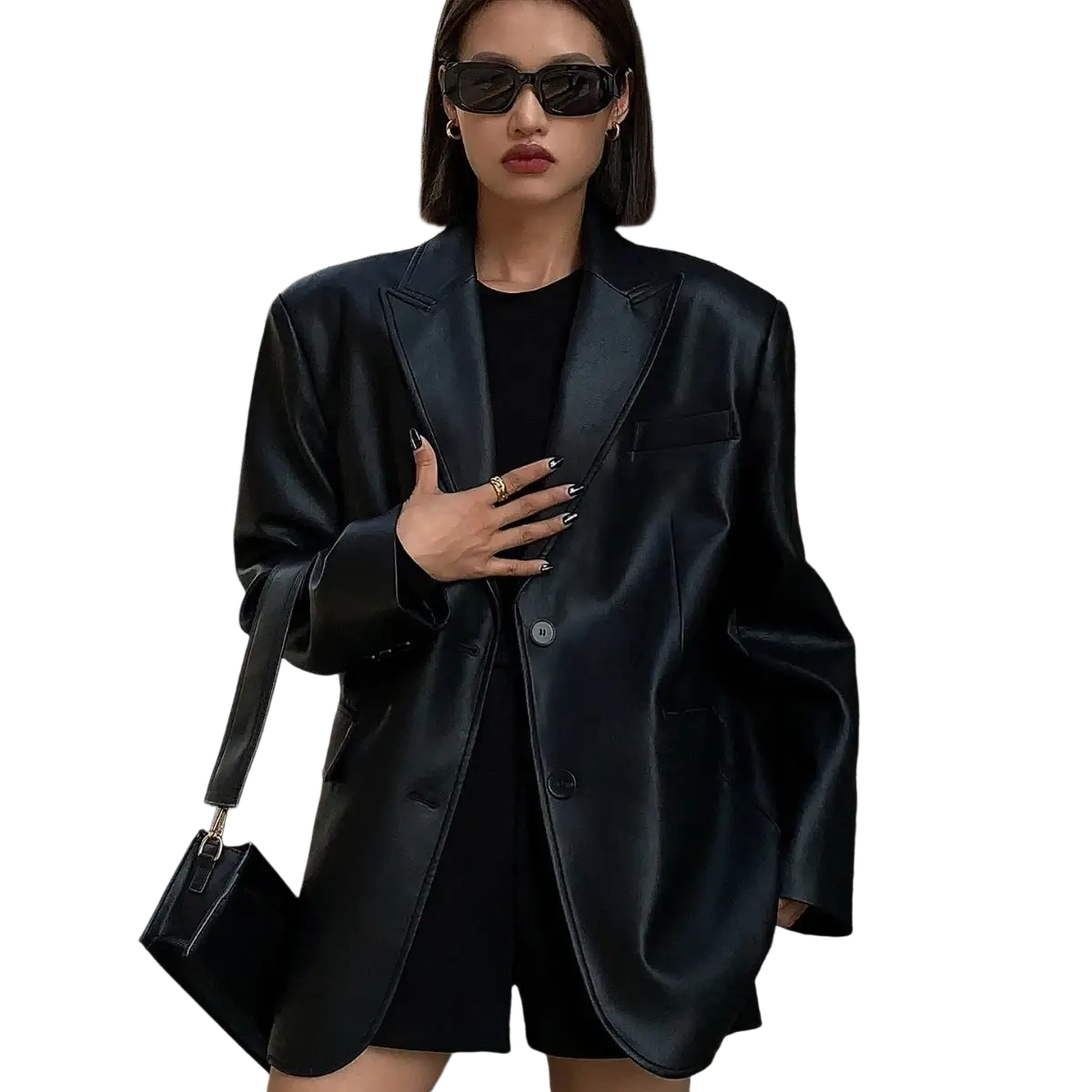 Black faux leather blazer for women with a loose fit and subtle sheen perfect for stylish outerwear