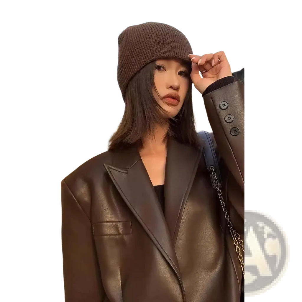 Brown ribbed knit beanie paired with a black faux leather women loose fit blazer jacket front view