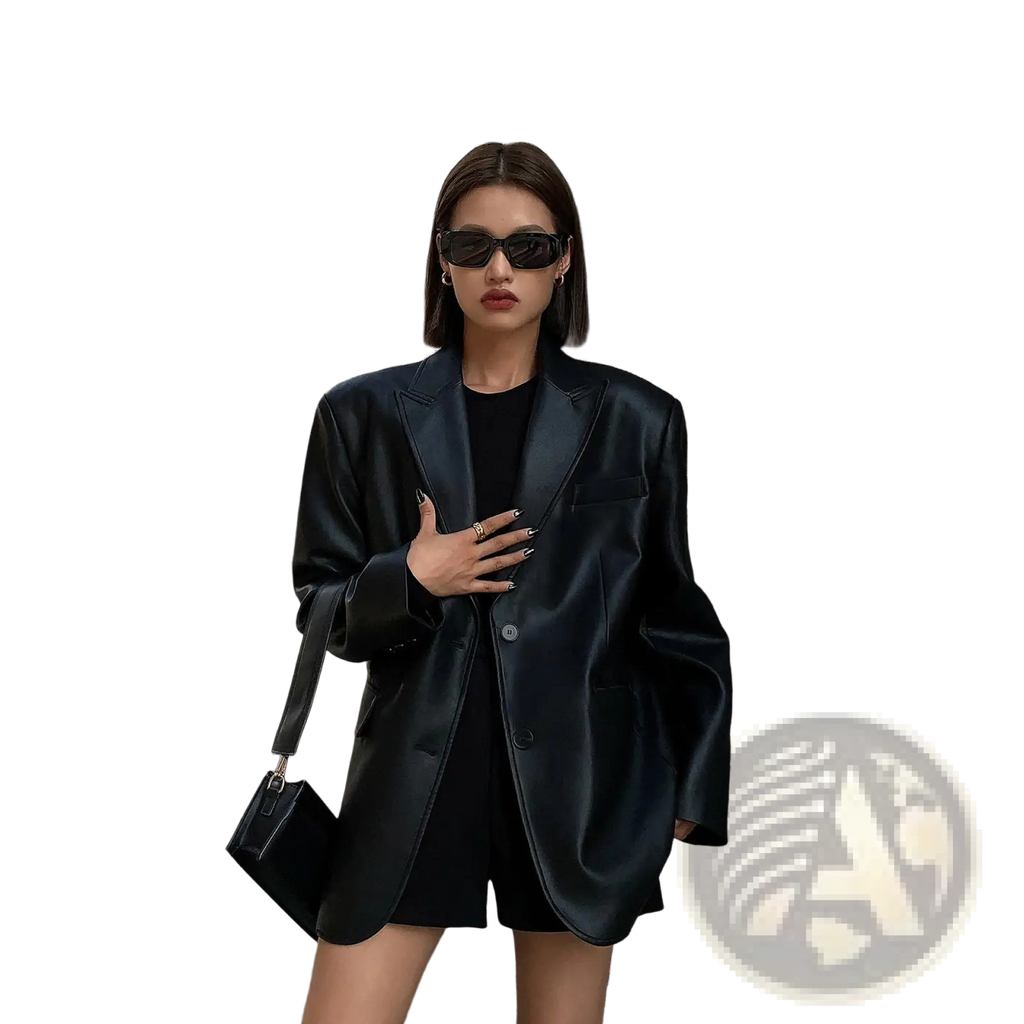 Black faux leather blazer for women with a structured oversized fit and single-breasted button closure