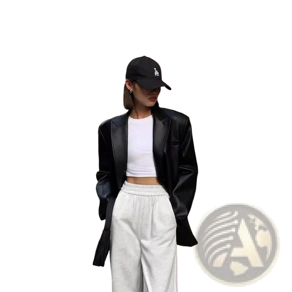 Black faux leather blazer for women with structured shoulders and a cropped fit in a loose fit jacket style
