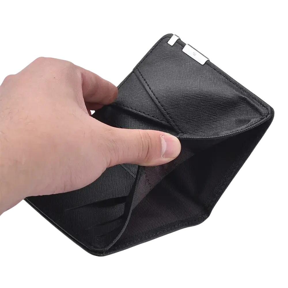 Black faux leather slim wallet with textured surface and silver-toned metal clasp for secure closure