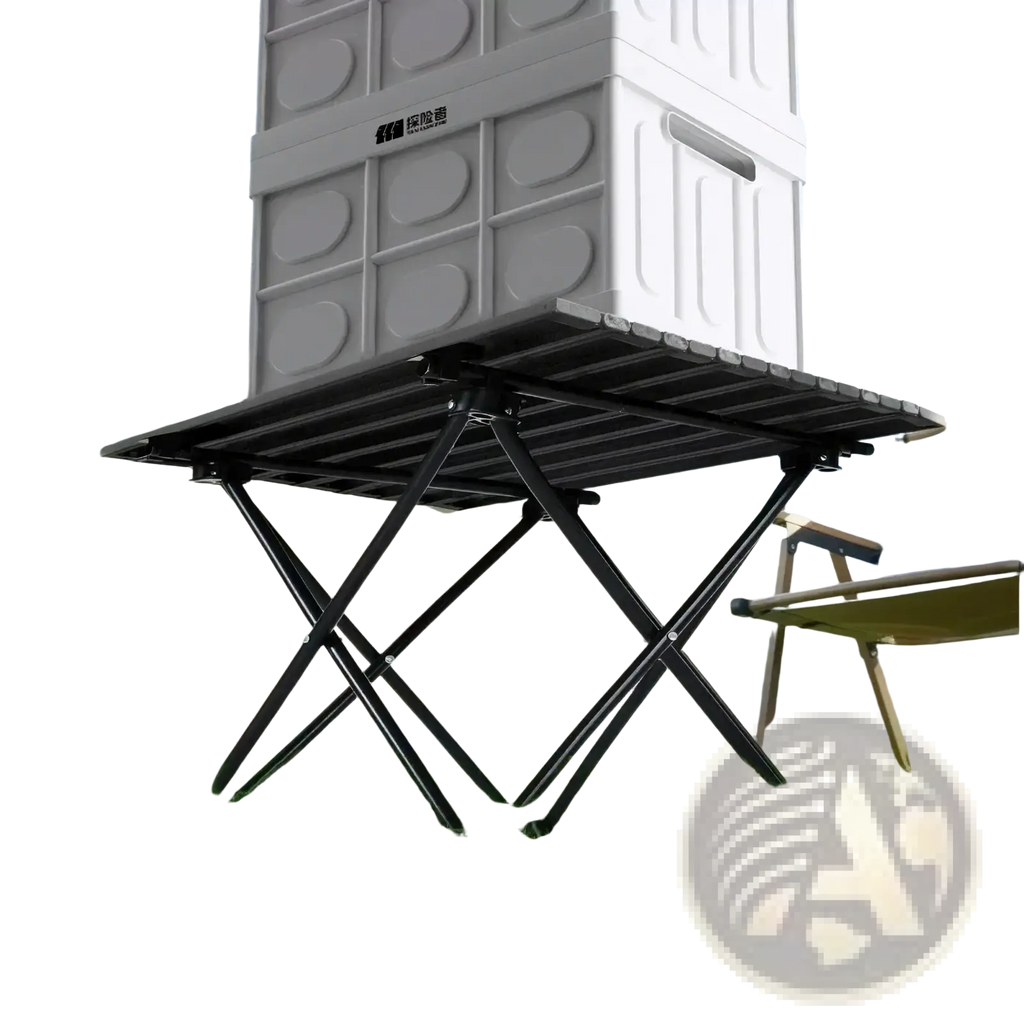 Black foldable outdoor camping table with a slatted surface and x-shaped legs for portable use