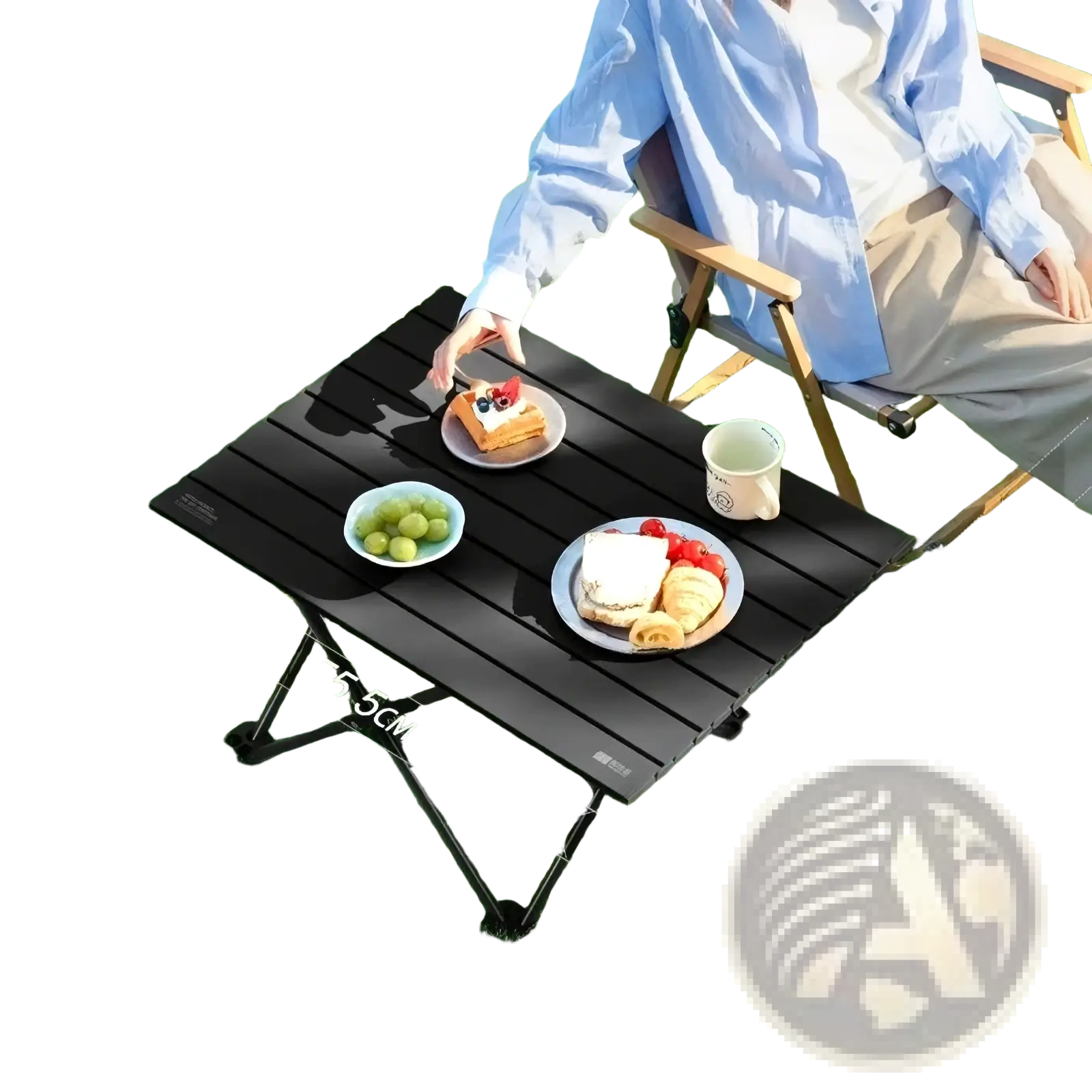 Black foldable outdoor camping table with slatted surface and metal legs for portable use