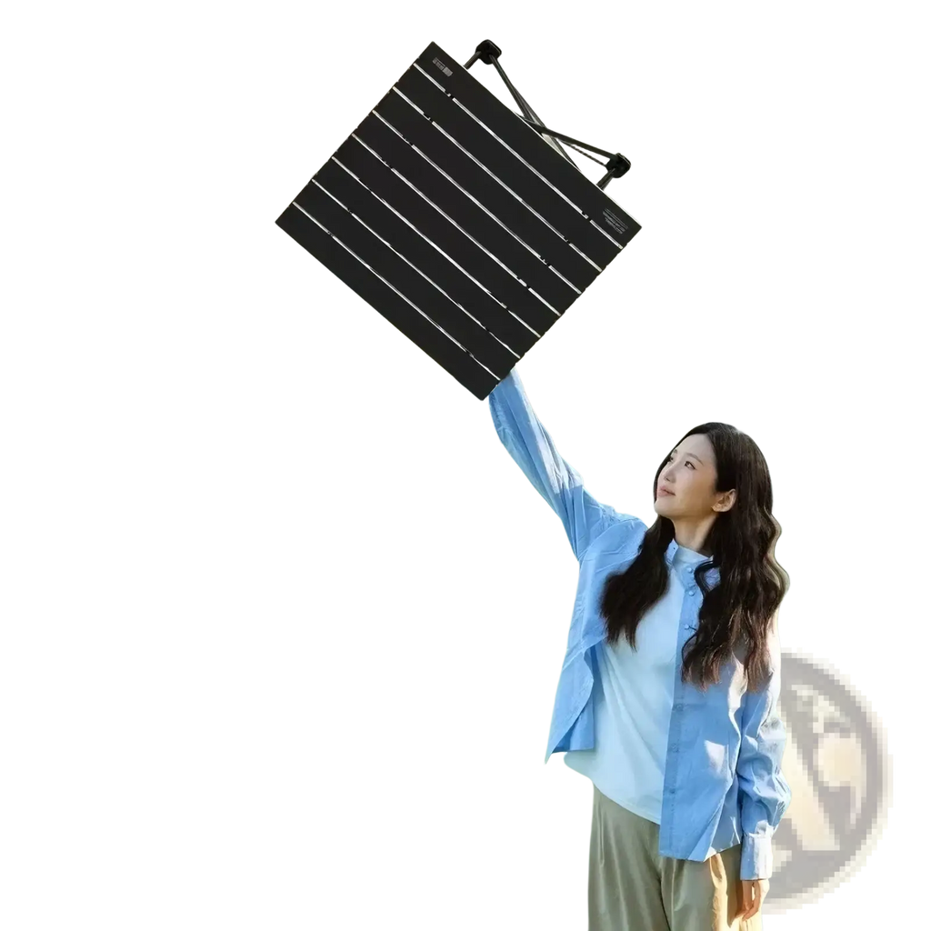 Black foldable outdoor camping table with sleek solar panel and integrated carrying handle for portable use