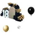 Black gold balloon arch kit featuring latex balloons in black and gold arranged for a birthday celebration