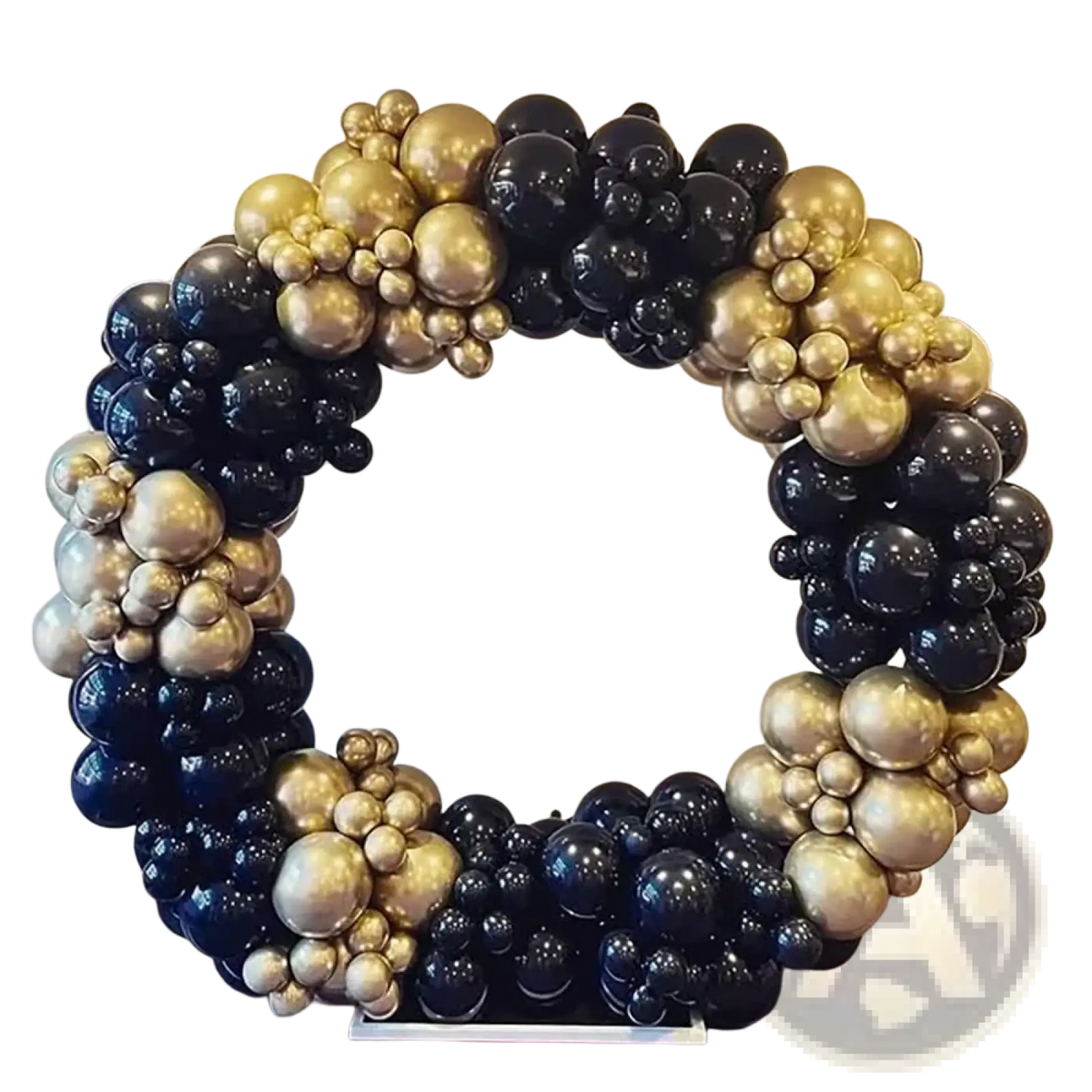 A luxurious black and gold balloon arch kit featuring glossy reflective balloons in varying sizes for parties