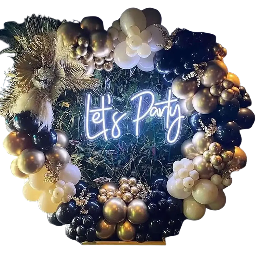 A black and gold balloon arch kit featuring a glowing neon lets party sign with black cream and gold balloons