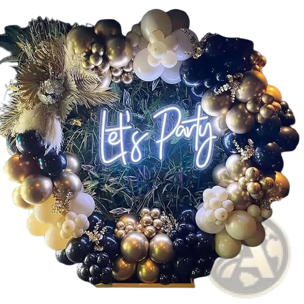A black and gold balloon arch kit featuring a glowing neon lets party sign with black cream and gold balloons