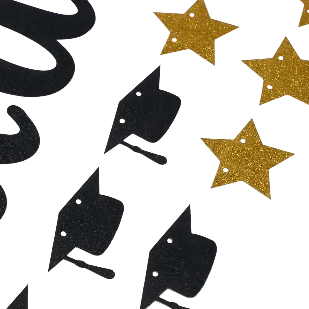 Black gold happy graduation banner featuring a glittery black and gold graduation cap with star confetti accents