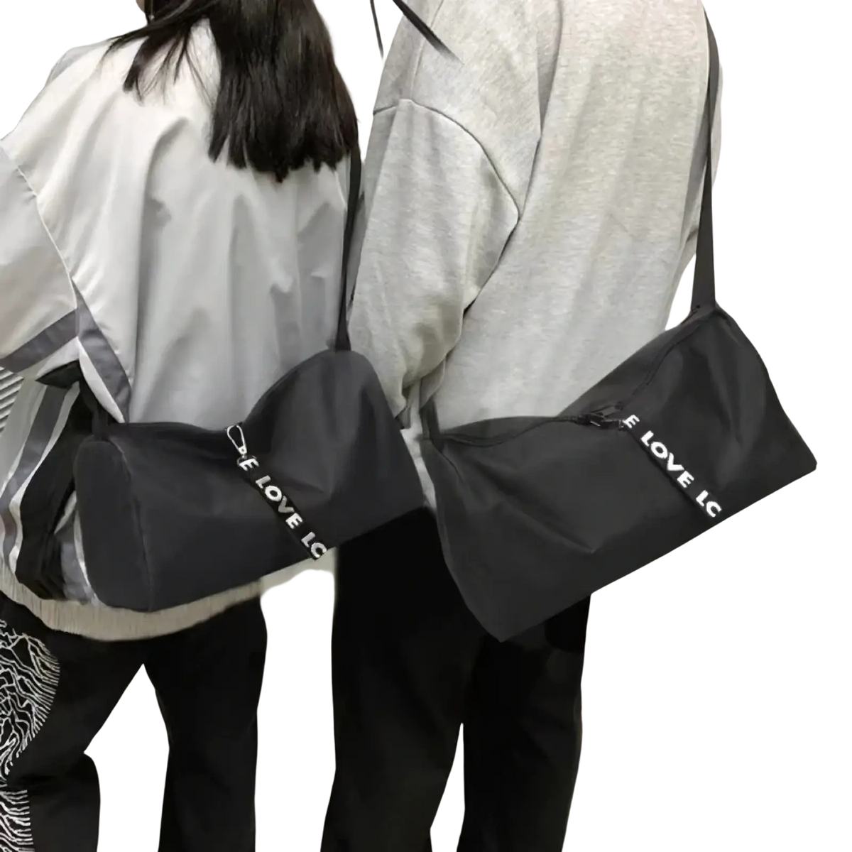Black gym duffel bag with white i love lc lettering on the side suitable for sports yoga travel and luggage use