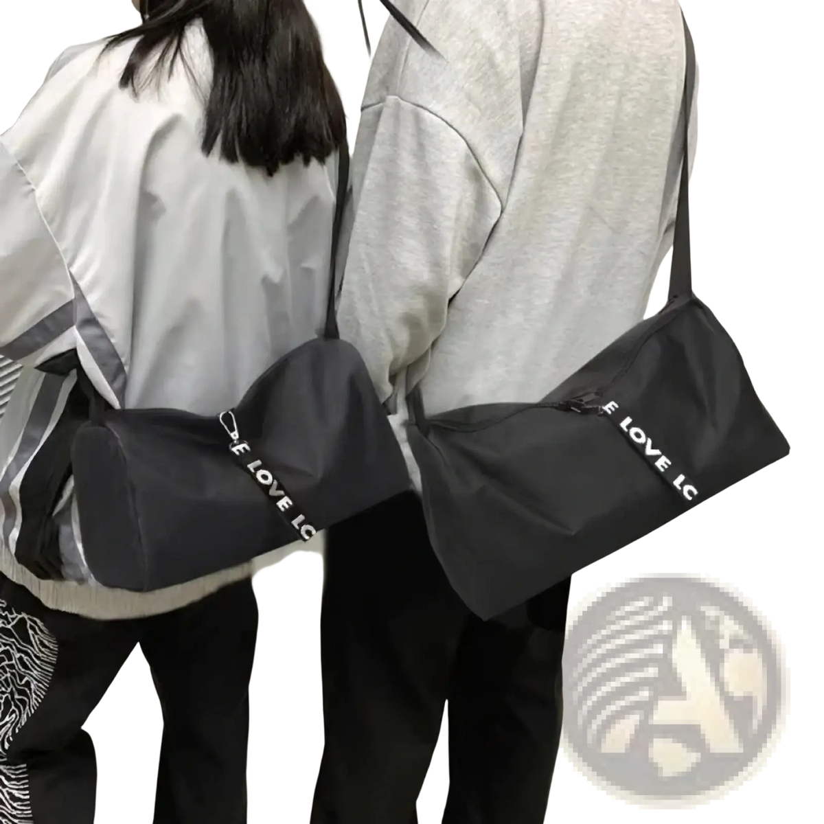 Black gym duffel bag with white i love lc lettering on the side suitable for sports yoga travel and luggage use