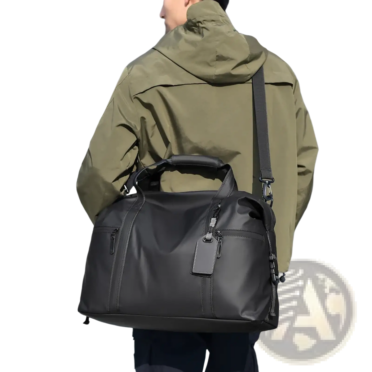 Black gym duffel bag made of nylon with a top handle and adjustable shoulder strap for travel and fitness gear use