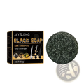 Black round bar shampoo soap with fine black and dark green speckles for natural darkening and hair growth