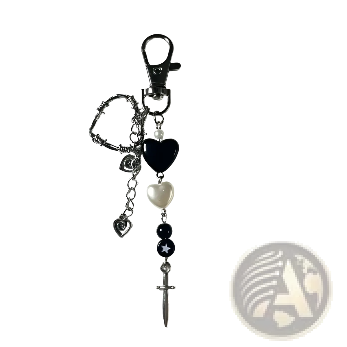 Black heart dagger keychain featuring silver-toned metal charms and beads with a dagger charm accessory