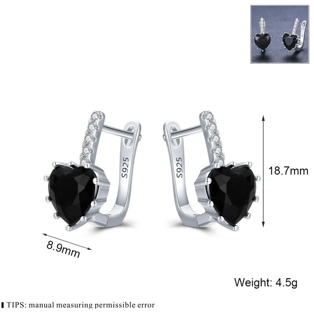 Silver heart-shaped stud huggie earrings with black zircon gemstones and clear crystals along the hook