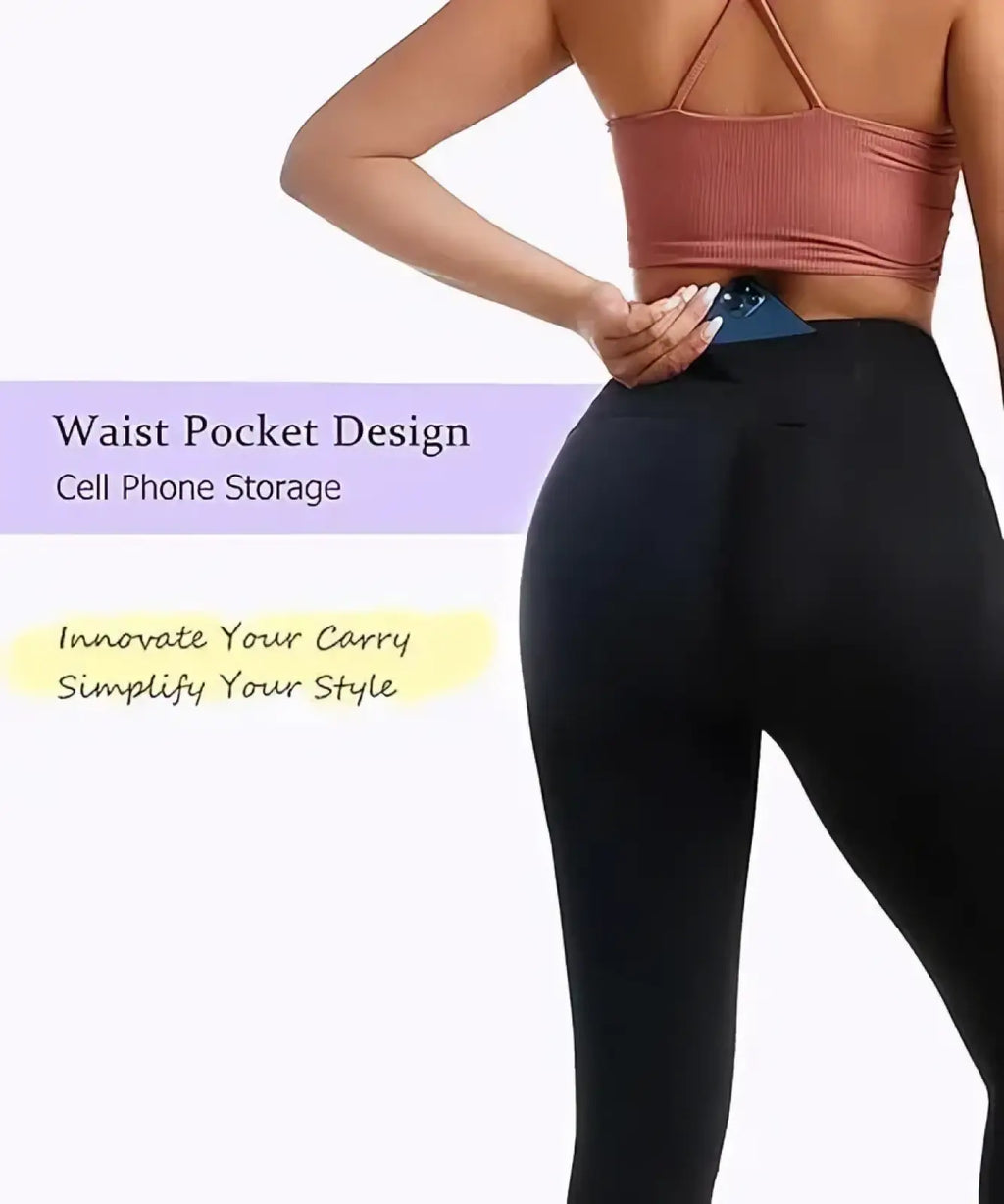 Black high waisted butt lifting compression leggings with built in waist pocket for cell phone storage shown from back side