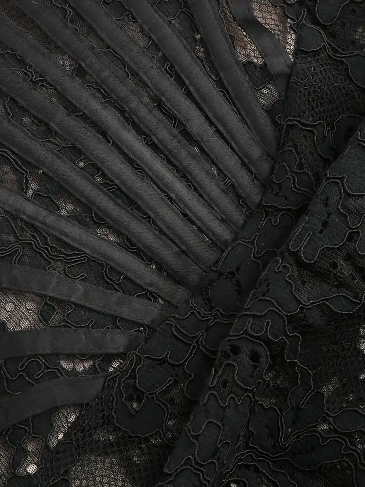 Black lace corset party dress featuring a bodice with intricate skull motifs and ribbed fabric panels