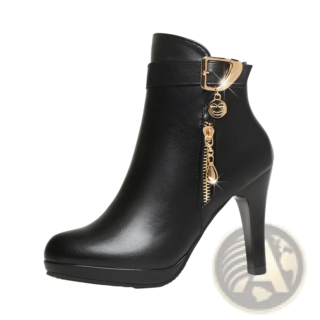Black leather ankle boots with gold buckle heel featuring a zipper and smiling face charm detail