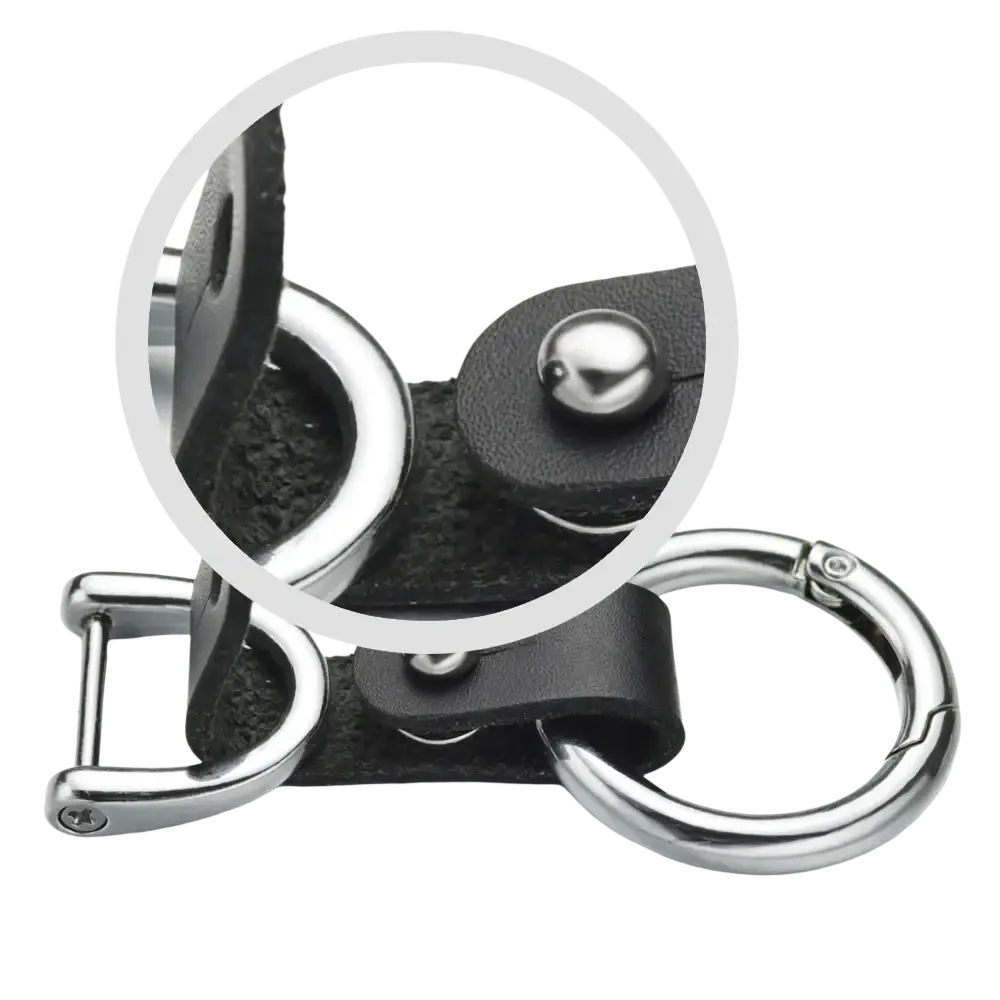 Black leather car keychain with silver hardware featuring a durable carabiner clip for secure attachment