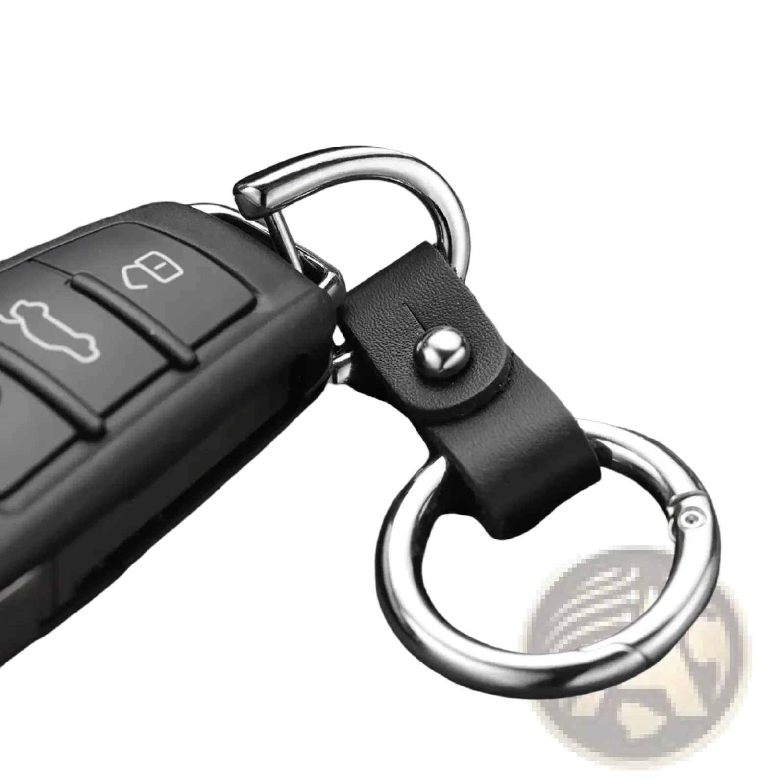 Black leather car keychain with silver metal ring and carabiner attached to a black remote fob